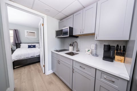 Family Suite | Private kitchenette | Full-size fridge, microwave, stovetop, toaster