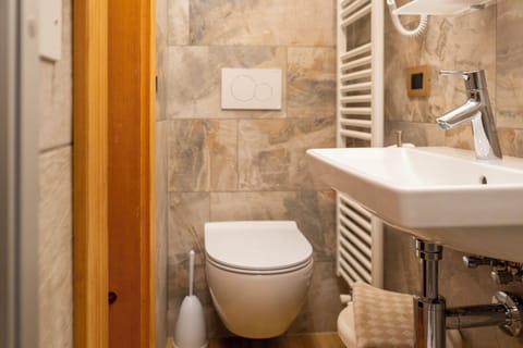 Alpine Views Balcony | Bathroom | Hair dryer, towels, soap, shampoo