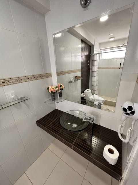 Comfort Double Room | Bathroom | Hair dryer, towels, soap, shampoo