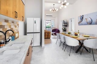 Comfort Apartment | Private kitchen | Full-size fridge, microwave, oven, stovetop