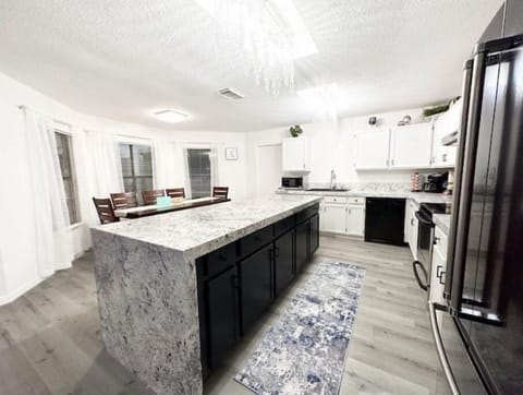 Waterfall kitchen island with everything you need. 