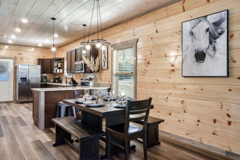 Imagine sharing delicious meals and laughter with loved ones in this cozy setting.