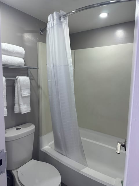 Room, 2 Queen Beds, Non Smoking | Bathroom | Hair dryer, towels