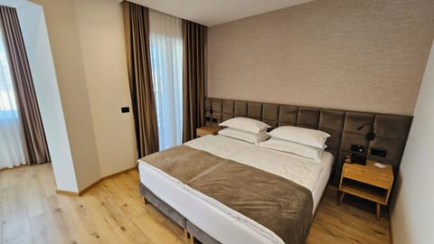 Deluxe Room | Memory foam beds, minibar, desk, laptop workspace