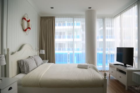 2 Bedrooms Condo | 2 bedrooms, premium bedding, blackout drapes, free WiFi