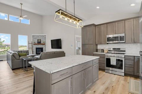 Open Concept from Stocked Kitchen to Living Room