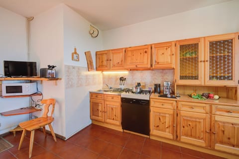 Family Apartment, Multiple Bedrooms, Mountainside (Charming Magognino Stresa Hills Lake) | Private kitchen | Fridge, microwave, stovetop, dishwasher