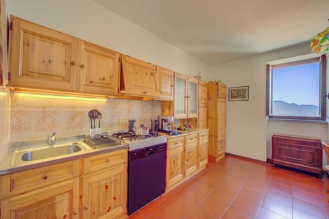 Family Apartment, Multiple Bedrooms, Mountainside (Charming Magognino Stresa Hills Lake) | Private kitchen | Fridge, microwave, stovetop, dishwasher