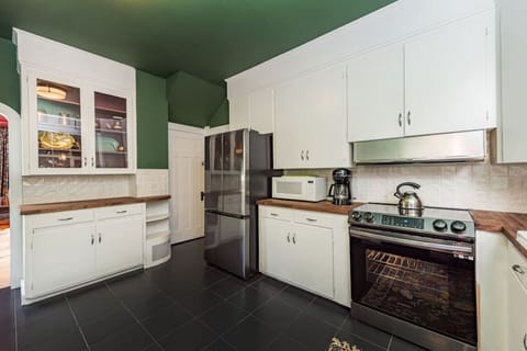 Our cabinets are stocked with everything you'll need to cook a feast -- salad spinner and blender included!