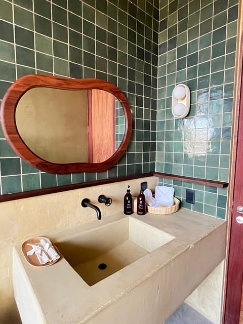 Signature Suite | Bathroom | Hair dryer, bathrobes, towels