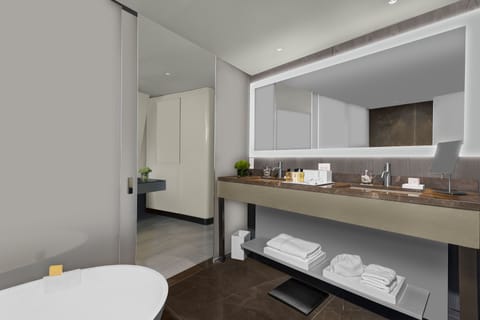 Design Studio Suite | Bathroom | Designer toiletries, hair dryer, bathrobes, slippers