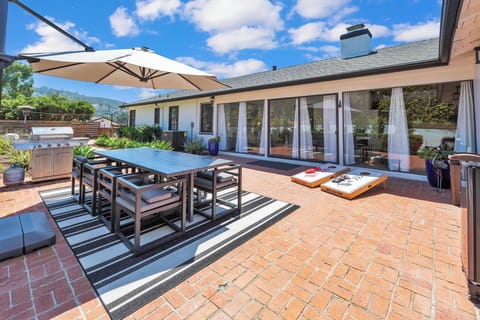 Dine al fresco after a game of cornhole.