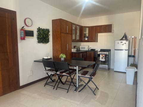 Comfort Apartment | Private kitchen | Full-size fridge, microwave, stovetop, dishwasher