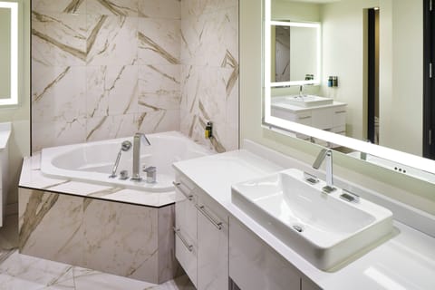 Designer toiletries, hair dryer, bathrobes, towels