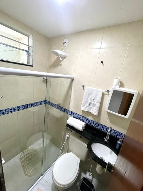 Family Apartment | Bathroom | Shower, rainfall showerhead, towels, toilet paper