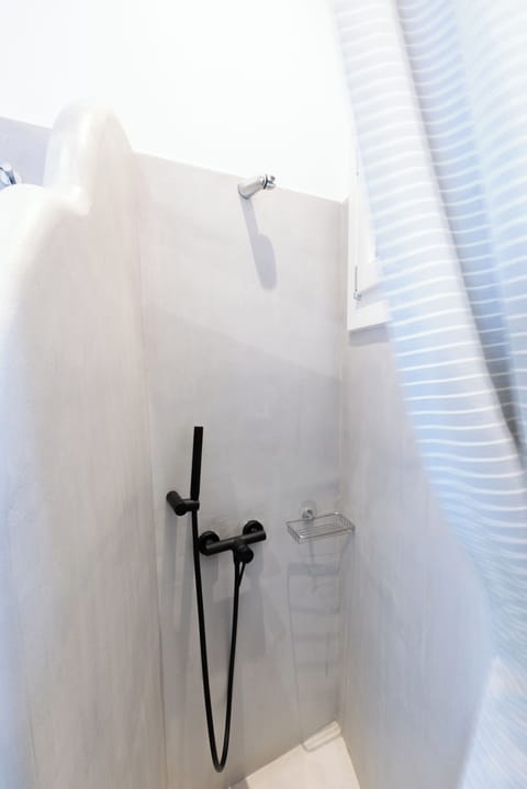 Shower, hair dryer, bathrobes, towels