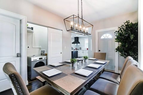 Dinning table sits 8 adults comfortably; Washing Dryer combo available for use (13lb Load Capacity)