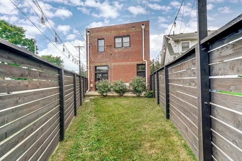 Backyard with string lights and grass