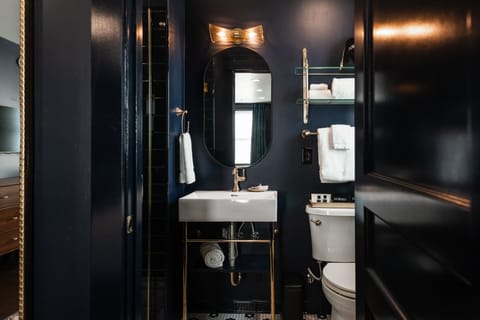 Designer toiletries, hair dryer, towels, soap