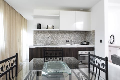 Deluxe Apartment, Terrace | Private kitchen | Fridge, oven, stovetop, dishwasher