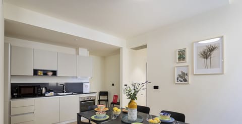 Elite Apartment | Private kitchen | Fridge, stovetop, espresso maker, electric kettle