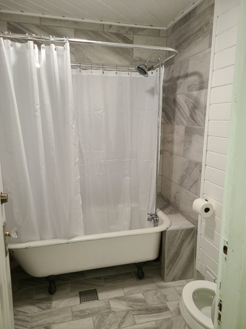 Separate tub and shower, deep soaking tub, towels, soap