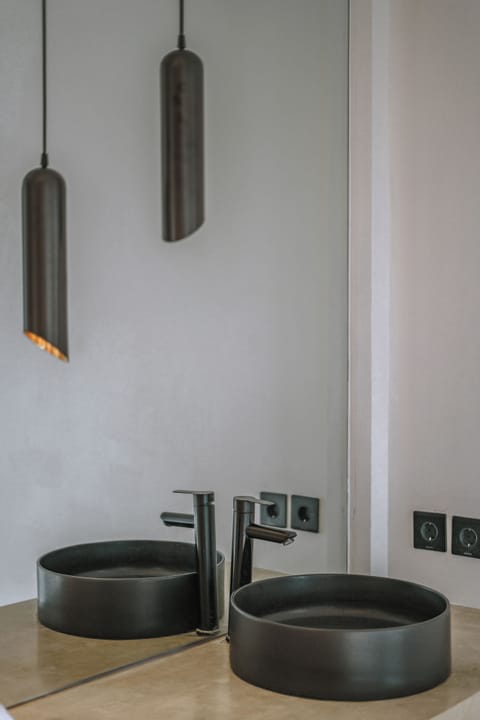 Shower, hair dryer, slippers, towels