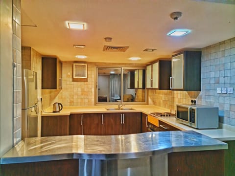 Standard Triple Room | Private kitchen | Fridge, microwave, oven, stovetop