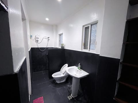 Standard Quadruple Room | Bathroom | Hair dryer, slippers