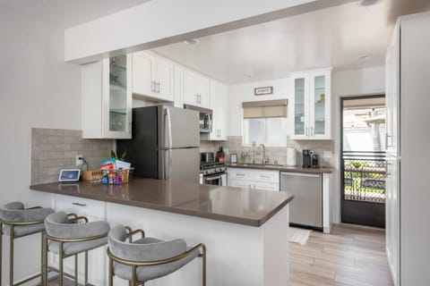 A freshly renovated kitchen is stocked with all high-quality essentials.