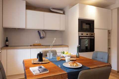 Luxury Apartment | Private kitchen | Full-size fridge, microwave, oven, stovetop