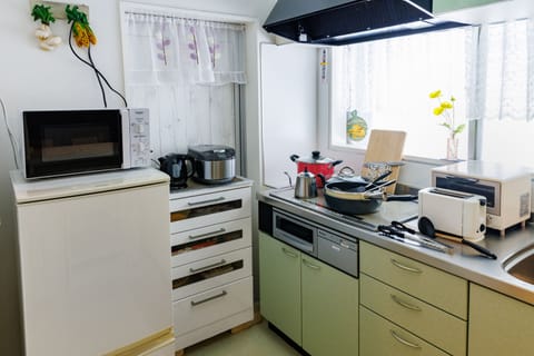 Family House | Private kitchen | Full-size fridge, microwave, stovetop, rice cooker