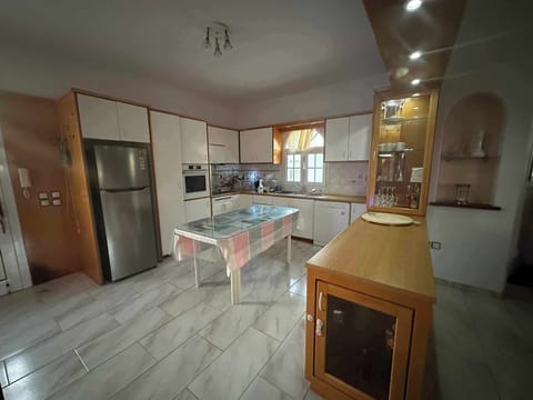 Villa | Private kitchen | Fridge, microwave, oven, stovetop