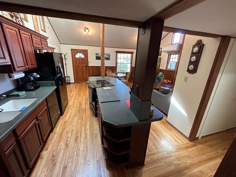 Full kitchen with many appliances 