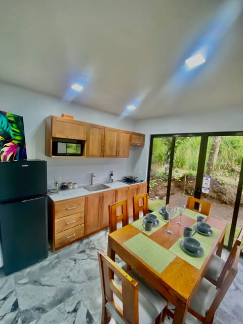 Deluxe Villa | Private kitchen | Full-size fridge, microwave, oven, stovetop