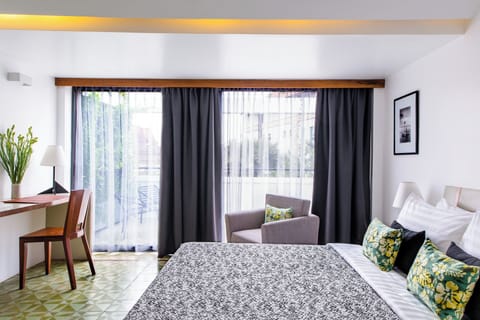 Deluxe Double Room, Terrace, City View | Premium bedding, minibar, desk, laptop workspace