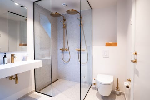 Family Room | Bathroom | Designer toiletries, hair dryer, heated floors, towels