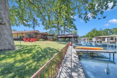 Water access is fenced off from the yard