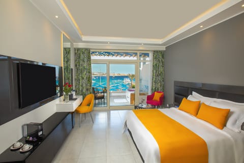 Deluxe Double Room, 1 King Bed, Beach View | Free minibar, in-room safe, desk, blackout drapes