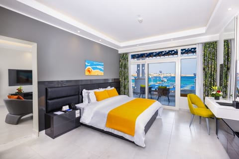 Junior Suite, 1 King Bed, Beach View | Free minibar, in-room safe, desk, blackout drapes