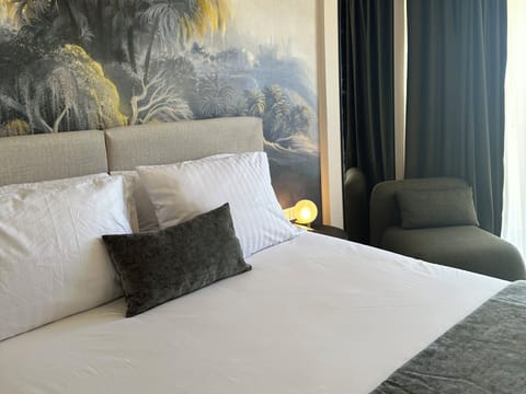 Superior Room | Minibar, in-room safe, iron/ironing board, free WiFi