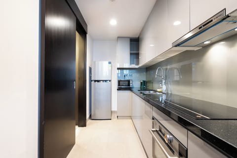 Panoramic Apartment | Private kitchen | Full-size fridge, microwave, oven, stovetop