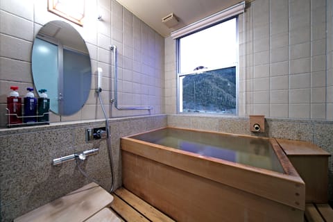 Premium Room, River View | Deep soaking bathtub