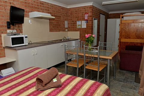 Standard Suite, 1 Bedroom, Non Smoking, Kitchenette (s/c villa 1 queen and 3 bunks) | Private kitchen | Fridge, microwave, stovetop, coffee/tea maker