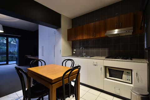 Suite, 1 Bedroom | Private kitchen | Fridge, microwave, stovetop, coffee/tea maker