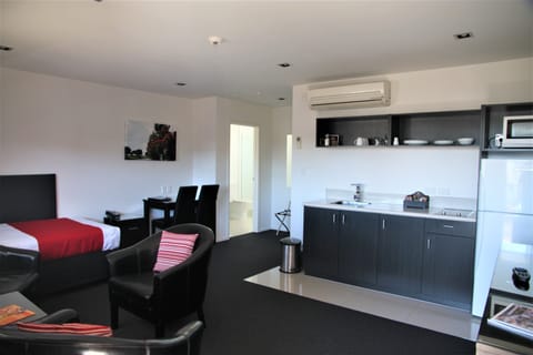 Luxury Suite | Living area | LCD TV, DVD player, iPod dock