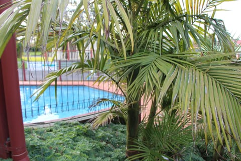 Premium Family Apartment, 2 Bedrooms, Kitchenette (Twin Share Linen Surcharge Applies & payable at p | Garden view