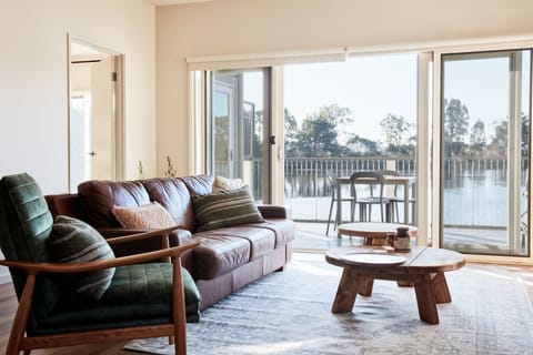 Luxury Lakeside Villa | Living area | Flat-screen TV, fireplace, Netflix, iPod dock