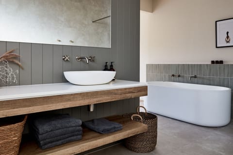 Luxury Lakeside Villa | Bathroom | Separate tub and shower, jetted tub, rainfall showerhead