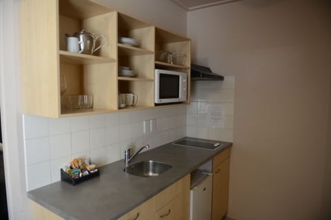 Apartment, 1 Bedroom (1 Double and 2 Single bed) | Private kitchenette | Microwave, coffee/tea maker, electric kettle